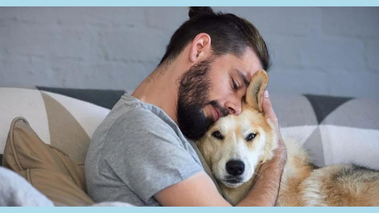 emotional pup owner hugs his pup