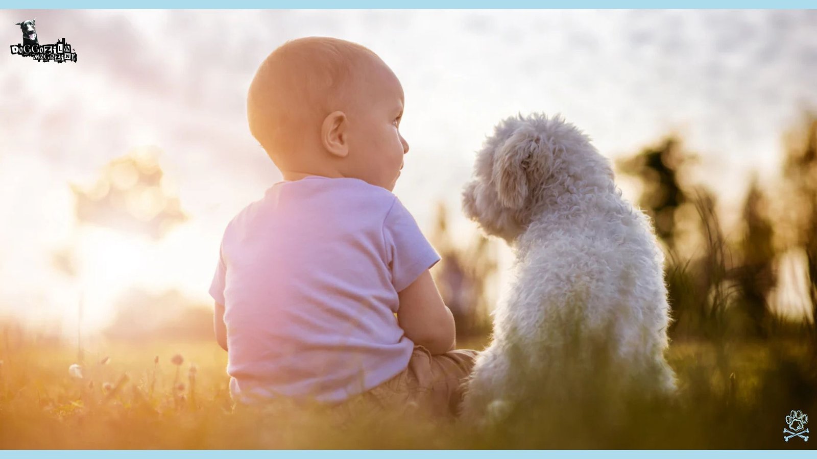 little baby and a little dog sitting in the grass together and watching the sunset