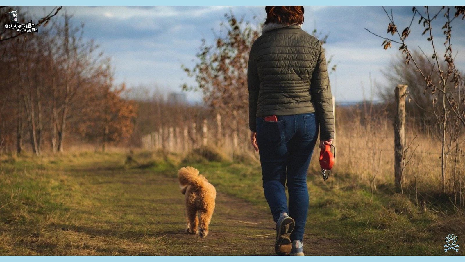 dog owner hiking freely with his furry friend
